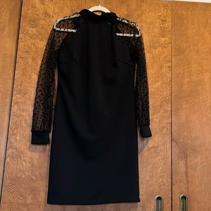 Size medium black dress with chiffon polka dot sleeves
